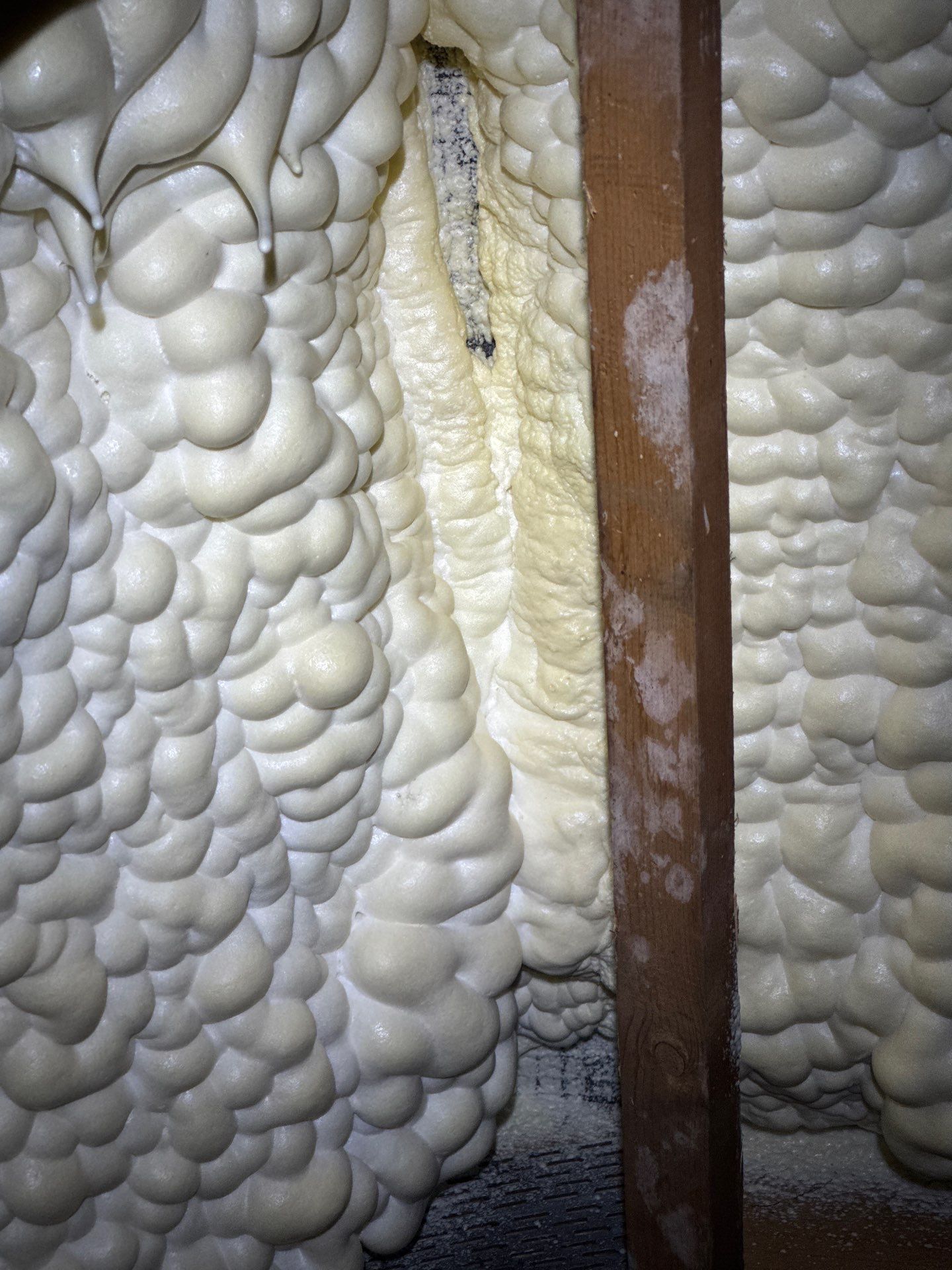 Professional spray foam removal in progress
